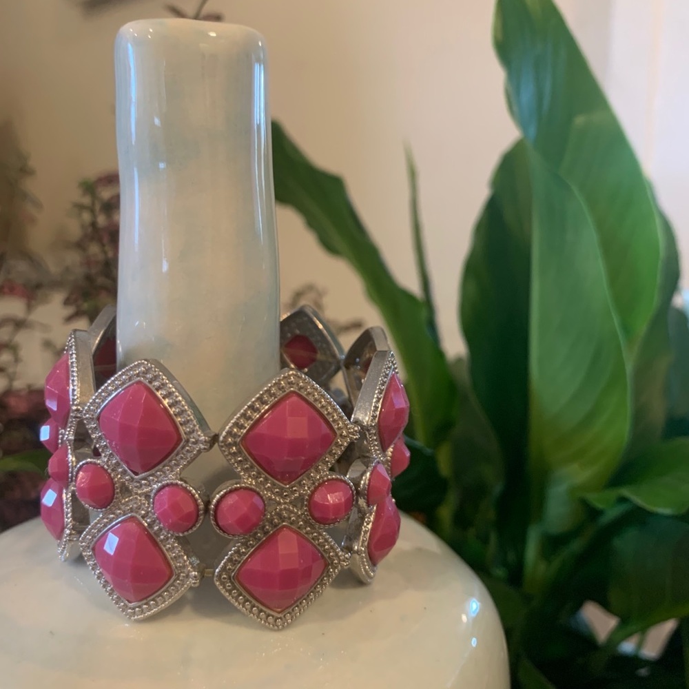 Silver bracelet with magenta stones